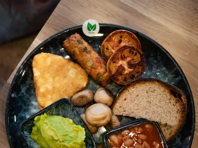 A Scottish plate of haggis, black pudding, bacon, egg and beans