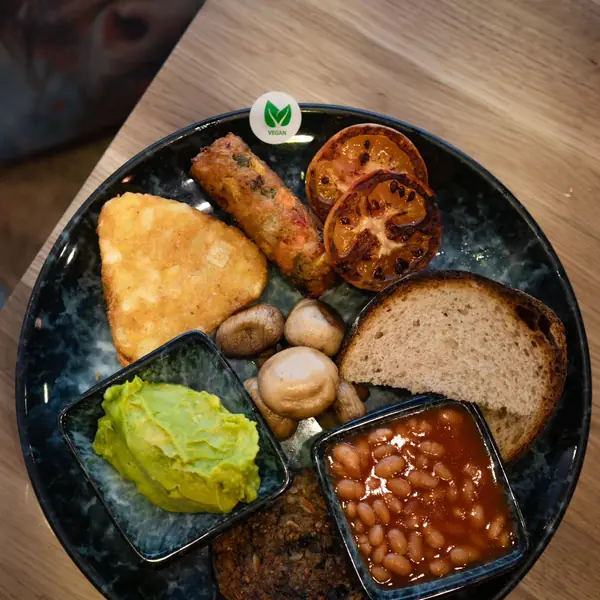 A full Scottish breakfast: haggis, black pudding, bacon, egg, beans and a potato scone